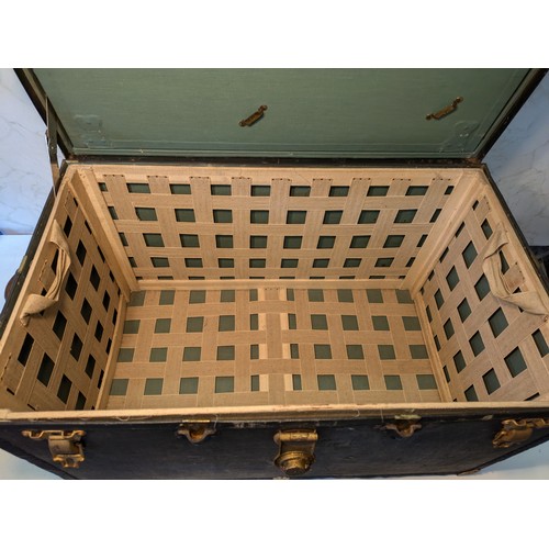 102 - a canvas travel case with wardrobe compartment