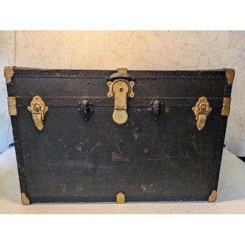 102 - a canvas travel case with wardrobe compartment