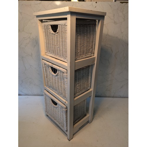 98 - a white wood shelving unit with wicker baskets