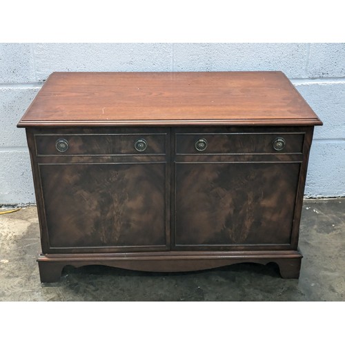 99 - a small dark wood storage unit