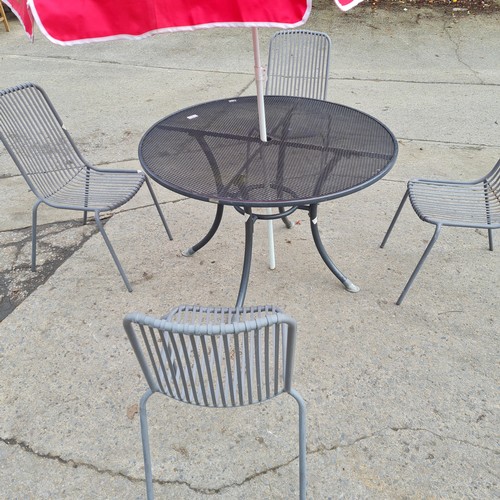 51 - A Metal 4 Chair and Table Set With Parasol