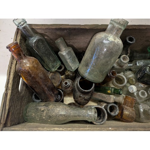 216 - A Variety Of Antique Bottles In A Wooden Box