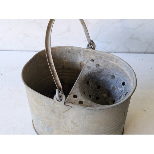 219 - A Galvanized Mop Bucket