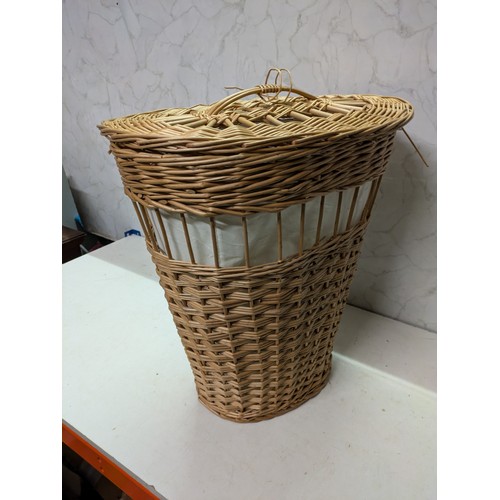 580 - A Wicker Laundry Basket