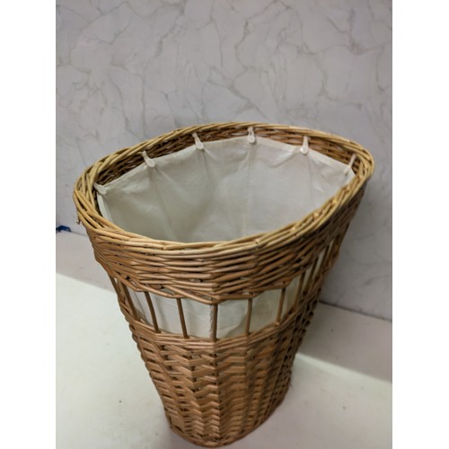 580 - A Wicker Laundry Basket