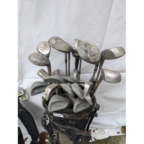 586 - A Selection Of Golf Clubs In Bags