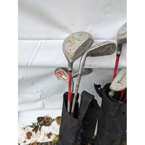 586 - A Selection Of Golf Clubs In Bags