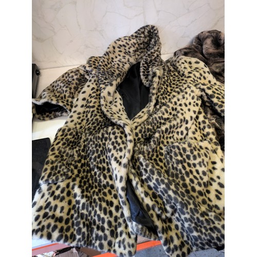 411 - a pair of faux fur jackets - size 1 and size 8