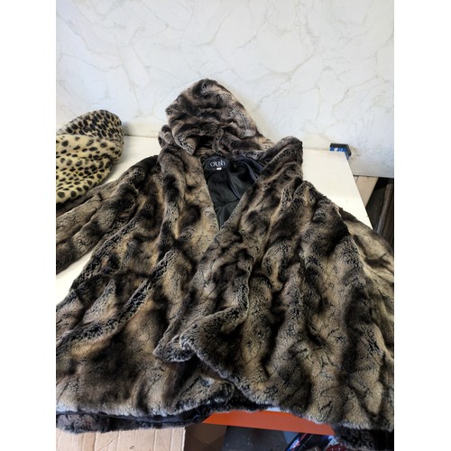 411 - a pair of faux fur jackets - size 1 and size 8