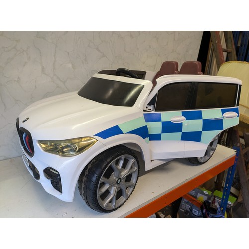 29 - a rollplay police BMW battery children's car with charger - working - new battery