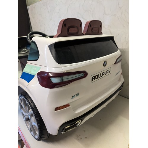 29 - a rollplay police BMW battery children's car with charger - working