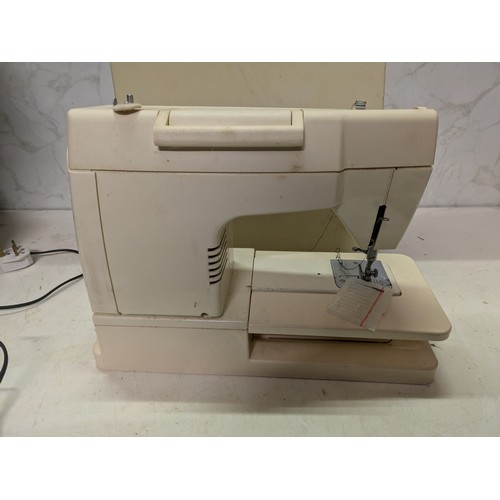 262 - singer model 7105bsewing machine with pedal in case