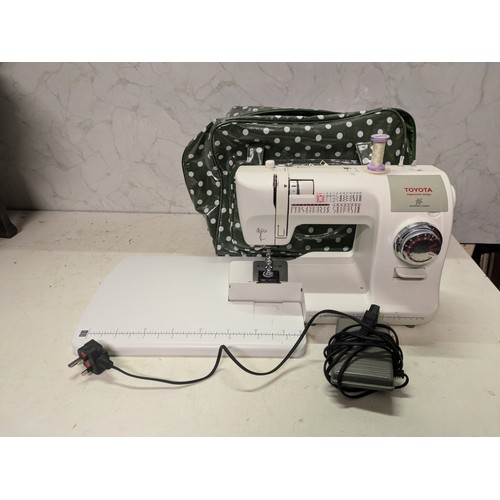 254 - Toyota model spa34 sewing machine with pedal in case