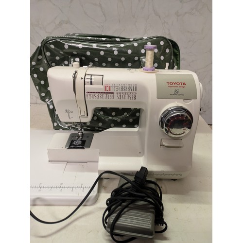 254 - Toyota model spa34 sewing machine with pedal in case