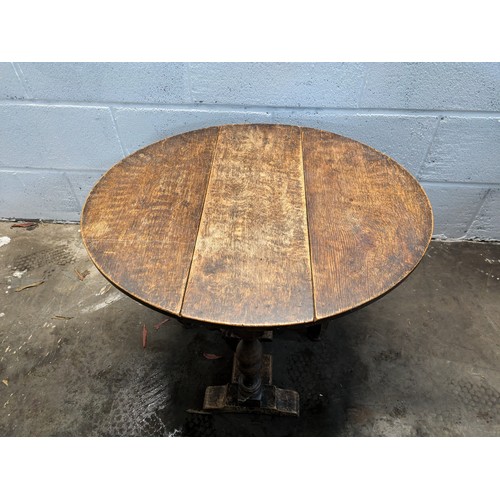 169 - An Antique Small Oval Drop Leaf Oak Coffee Table - approx 68x60x48cm