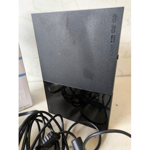 292 - a boxed PlayStation 2 slim console