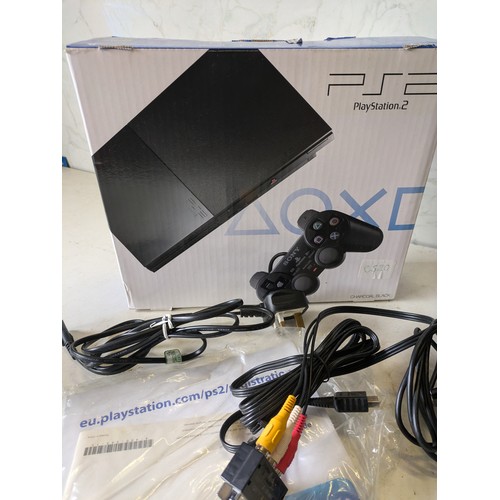 292 - a boxed PlayStation 2 slim console