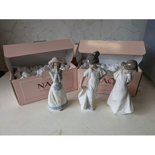 459 - a set of 3 nao by lladro porcelain figures in boxes