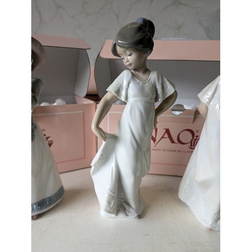 459 - a set of 3 nao by lladro porcelain figures in boxes