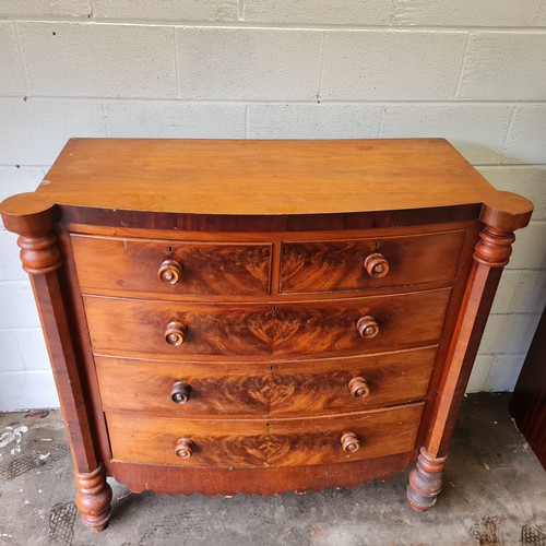 133 - a large antique flame mahogany graduated chest of drawers with carved columns approx 130cmx130cmx53c... 