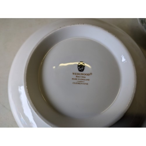 439 - a Wedgewood bone china clementine set