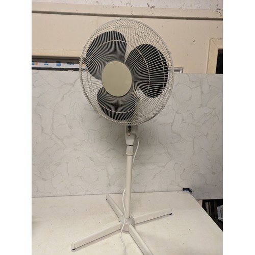 473 - a standing floor fan