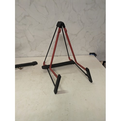 526 - a pair of guitar stands