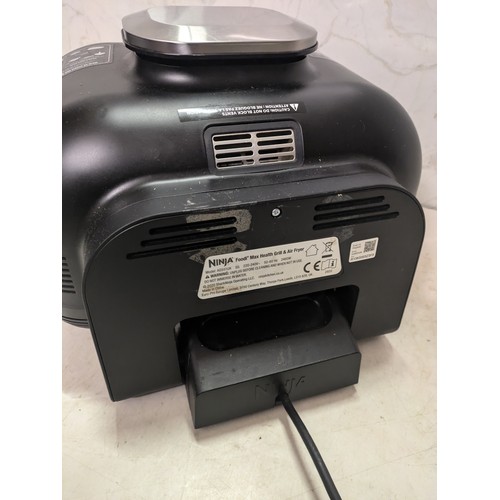 323 - a ninja foodi max health grill & air fryer model ag551uk - Fully Working