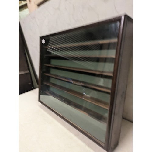 143 - a vintage glass fronted shelving display case