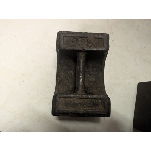 498 - a selection of 3 steel weights - 2 marked Avery - 2 20kg and one 10kg