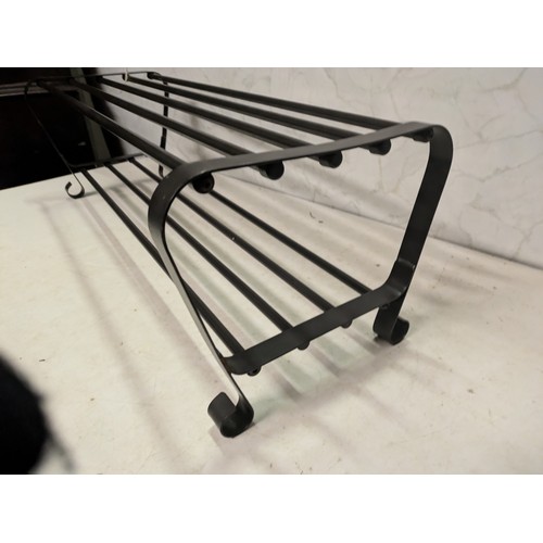 139 - a metal shoe rack