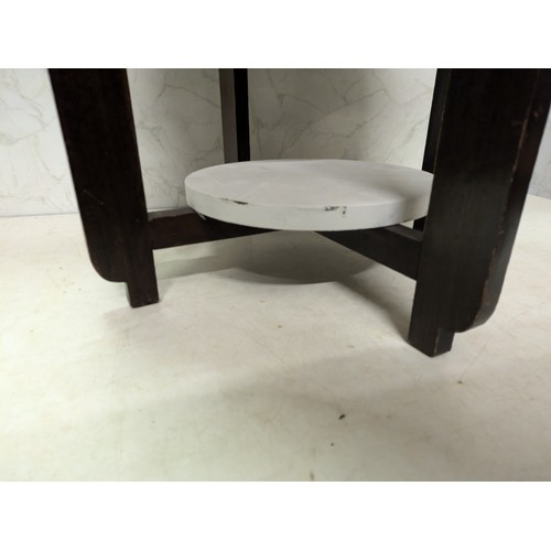 140 - a dark wood and white painted circle table