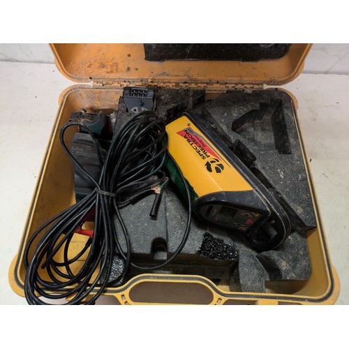 319 - spectra precision dual grade 1255 laser level in case with charger and remote