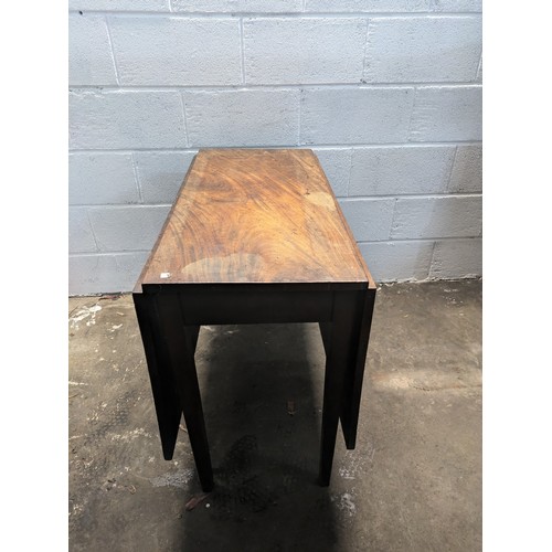 129 - an antique oak drop leaf table approx 145x73x94cm