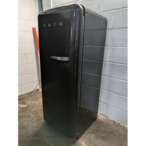 315 - a black Smeg refrigerator - fully working