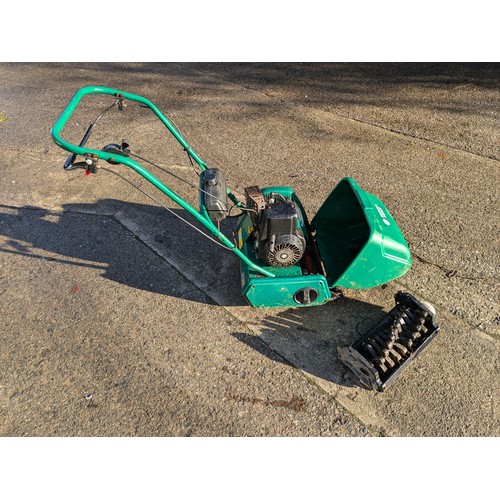 58 - Suffolk punch petrol mower with scarifier attachment