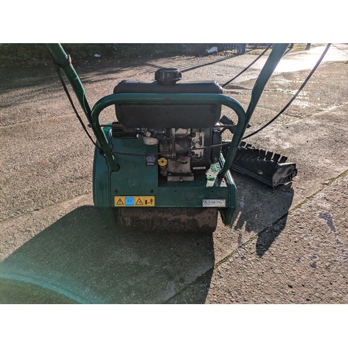 58 - Suffolk punch petrol mower with scarifier attachment