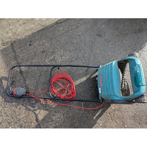 626 - a Bosch arm 32 f electric lawn Raker