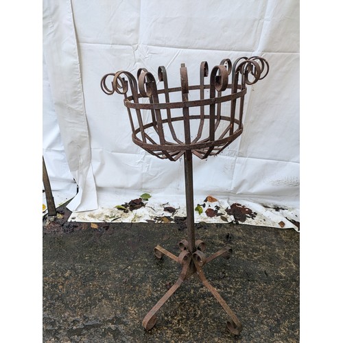 16 - a metal garden plant stand