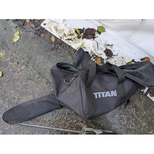 12 - titan model ttl759chn petrol chainsaw in protective bag