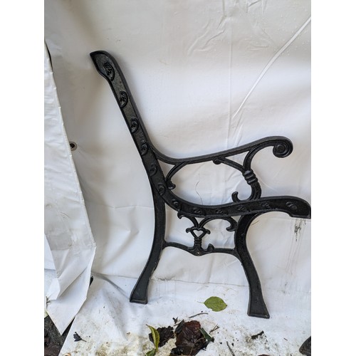 6 - a Pair of cast iron bench ends