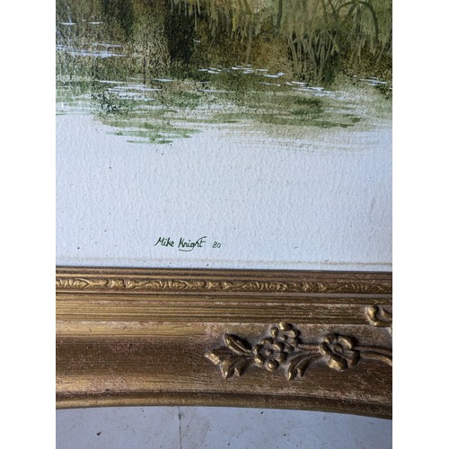 539 - A landscape painting in an ornate gold frame