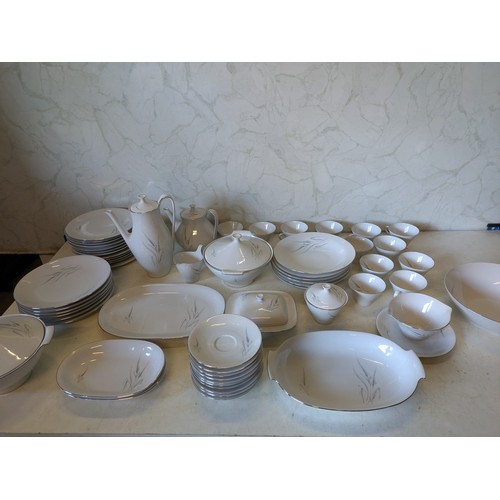 494 - a Bavarian crockery set containing dozens of porcelain pieces