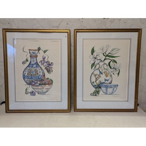 534 - a pair of 1980 chinese vase & lillies prints