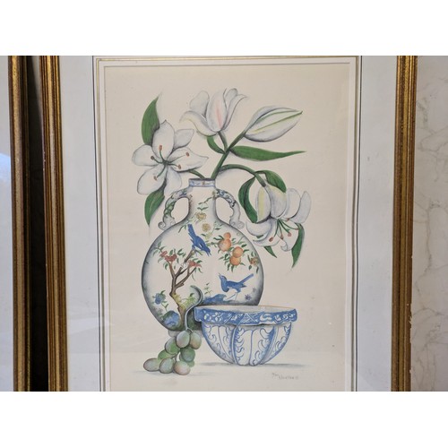 534 - a pair of 1980 chinese vase & lillies prints