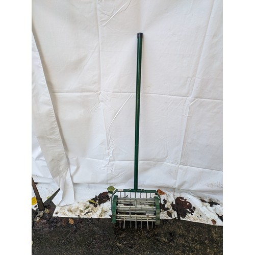 7 - a push along lawn scarifier