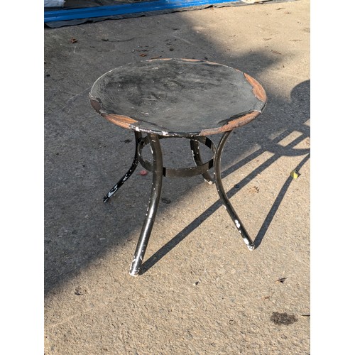 24 - A Small Metal Outdoor Table