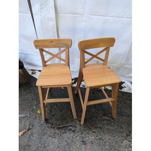 79 - a Pair of wooden chairs