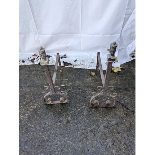 147 - a pair of antique wrought iron fire supports