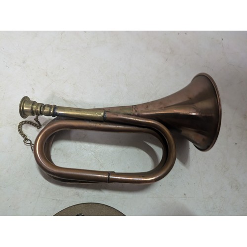 379 - a copper bugle and a reproduction of a WW1 death plaque for Colonel Robert Beech